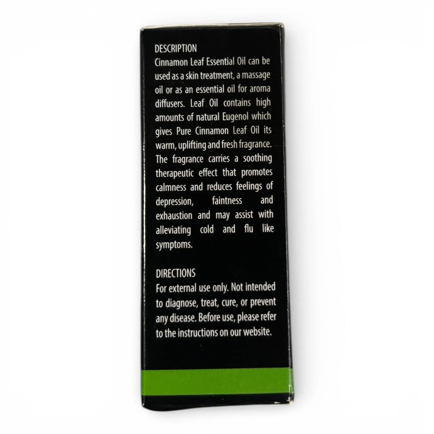 Ceylon Cinnamon leaf essential oil packaging with text on a white background